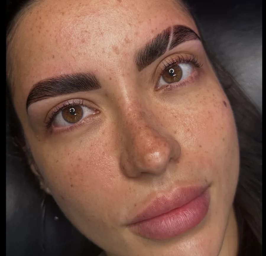 Brow lamination on a client with freckles